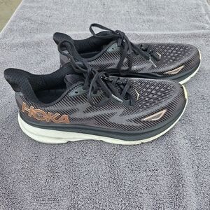 Hoka Black and Peach Athletic Shoes